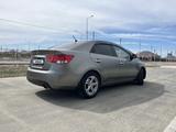Kia Cerato 2012 года за 4 200 000 тг. в Атырау – фото 5