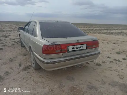 Mazda 626 1991 года за 700 000 тг. в Жанаозен – фото 3