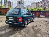 Kia Carnival 2003 годаүшін1 800 000 тг. в Астана – фото 3