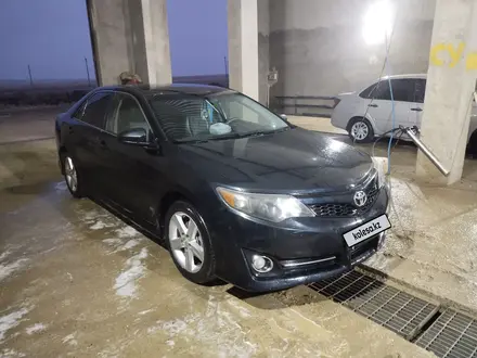 Toyota Camry 2014 года за 8 500 000 тг. в Актобе – фото 4