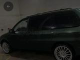 Kia Carnival 1998 годаfor1 300 000 тг. в Шымкент