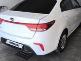 Kia Rio 2017 года за 3 800 000 тг. в Жанаозен