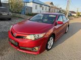 Toyota Camry 2014 года за 7 200 000 тг. в Атырау – фото 2