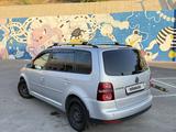 Volkswagen Touran 2008 года за 3 700 000 тг. в Алматы – фото 3