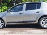 Renault Sandero 2011 года за 2 835 578 тг. в Караганда – фото 2