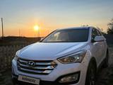 Hyundai Santa Fe 2015 года за 8 500 000 тг. в Актобе