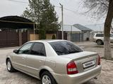 Mazda 323 2002 года за 3 000 000 тг. в Алматы – фото 3