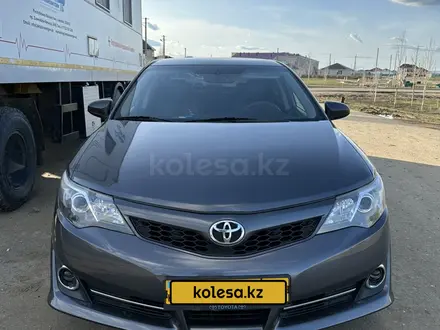 Toyota Camry 2014 года за 8 000 000 тг. в Актобе