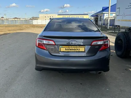 Toyota Camry 2014 года за 8 000 000 тг. в Актобе – фото 3