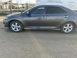 Toyota Camry 2014 года за 8 700 000 тг. в Актобе – фото 2