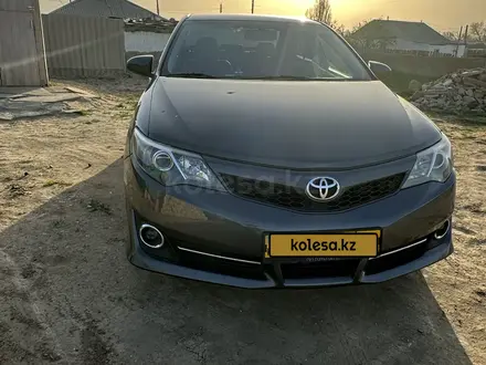 Toyota Camry 2014 года за 8 000 000 тг. в Актобе – фото 4