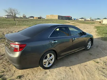 Toyota Camry 2014 года за 8 000 000 тг. в Актобе – фото 5