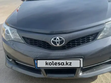 Toyota Camry 2014 года за 8 000 000 тг. в Актобе – фото 6