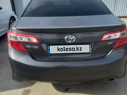 Toyota Camry 2014 года за 8 000 000 тг. в Актобе – фото 7