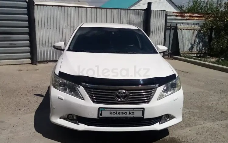 Toyota Camry 2013 годаfor9 800 000 тг. в Атырау