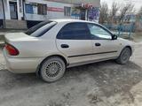 Mazda 323 1995 года за 2 000 000 тг. в Калбатау – фото 2