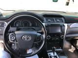 Toyota Camry 2014 года за 9 000 000 тг. в Атырау – фото 3