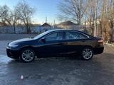 Toyota Camry 2015 года за 7 000 000 тг. в Актобе – фото 4