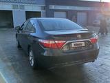 Toyota Camry 2015 года за 7 000 000 тг. в Актобе – фото 5