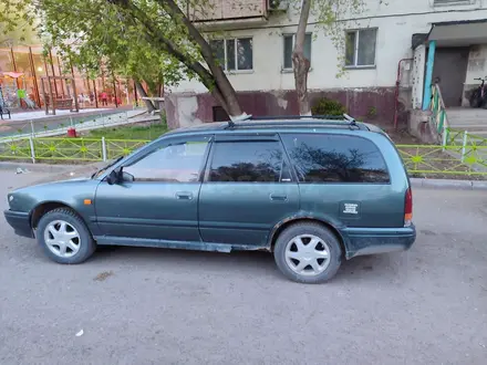 Nissan Primera 1993 года за 750 000 тг. в Астана – фото 2