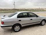 Toyota Carina E 1997 годаүшін1 650 000 тг. в Актау