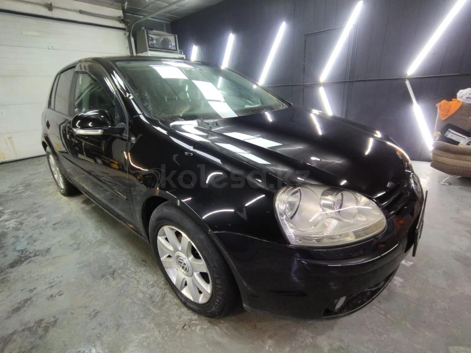 Volkswagen Golf 2004 г.