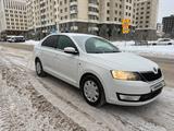 Skoda Rapid 2014 годаүшін5 200 000 тг. в Астана – фото 2