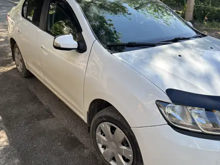 Renault Logan 2015 года за 3 500 000 тг. в Уральск – фото 3