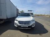 Hyundai Santa Fe 2014 года за 8 500 000 тг. в Атырау