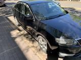 Skoda Rapid 2013 года за 4 000 000 тг. в Караганда – фото 2