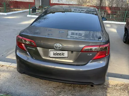 Toyota Camry 2014 года за 5 300 000 тг. в Актобе – фото 2