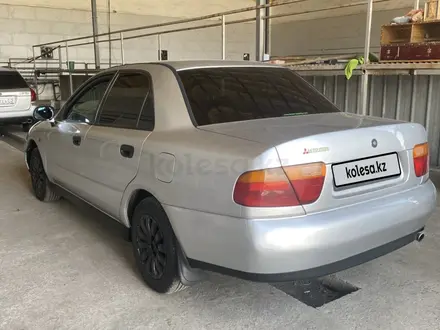 Mitsubishi Carisma 1998 года за 1 100 000 тг. в Алматы – фото 3