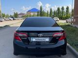 Toyota Camry 2014 года за 8 300 000 тг. в Актобе – фото 4