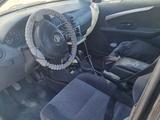 Nissan Almera 2013 года за 2 000 000 тг. в Курмангазы – фото 3