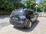 Mitsubishi Outlander 2009 годаүшін7 400 000 тг. в Шымкент – фото 3