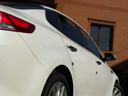 Kia K5 2015 года за 8 800 000 тг. в Алматы – фото 14