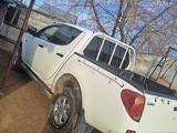 Mitsubishi L200 2009 года за 5 000 000 тг. в Актобе – фото 2