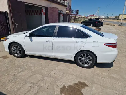 Toyota Camry 2014 года за 5 250 000 тг. в Кульсары – фото 9