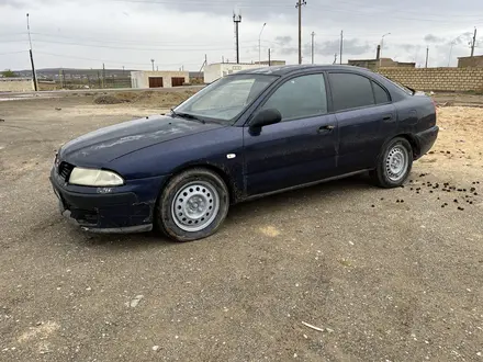 Mitsubishi Carisma 1999 года за 600 000 тг. в Актау