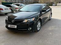 Toyota Camry 2014 года за 8 100 000 тг. в Жанаозен