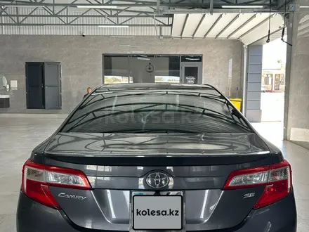 Toyota Camry 2014 года за 7 300 000 тг. в Жанаозен