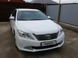 Toyota Camry 2014 года за 9 700 000 тг. в Атырау