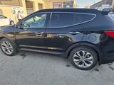 Hyundai Santa Fe 2013 года за 7 800 000 тг. в Актау – фото 3