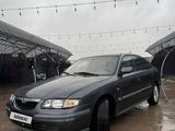 Mazda 626 1998 года за 1 500 000 тг. в Шиели – фото 4
