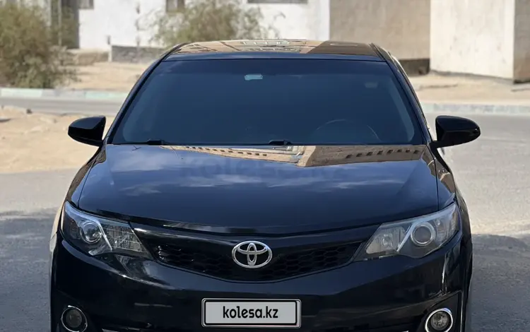 Toyota Camry 2013 года за 6 800 000 тг. в Жанаозен