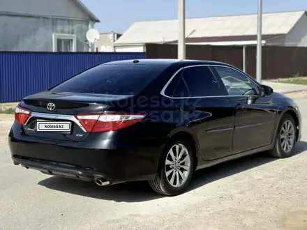 Toyota Camry 2014 года за 8 000 000 тг. в Атырау – фото 2