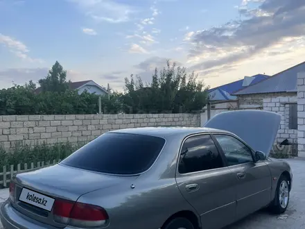 Mazda Cronos 1994 года за 1 590 000 тг. в Жанаозен – фото 5