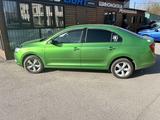 Skoda Rapid 2013 года за 5 000 000 тг. в Караганда – фото 2