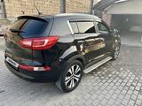 Kia Sportage 2012 года за 7 500 000 тг. в Шымкент – фото 4