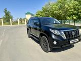 Toyota Land Cruiser Prado 2014 года за 18 700 000 тг. в Атырау – фото 2